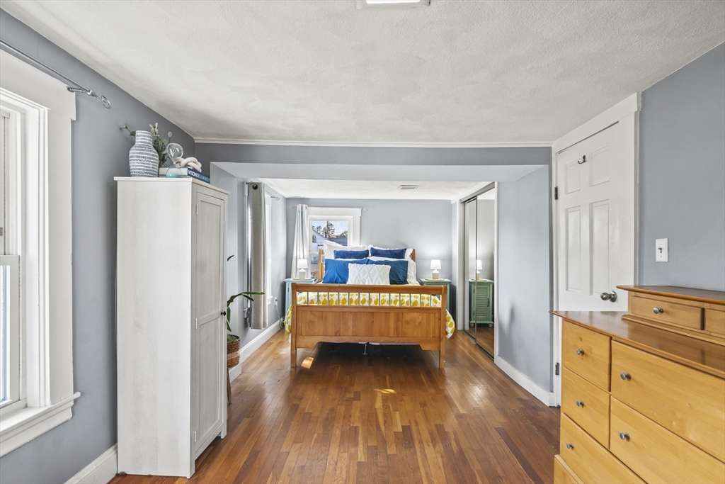7 Allendale Avenue Billerica, MA 01821 - Photo 20 of 42 a view of a bedroom with bed and wooden floor