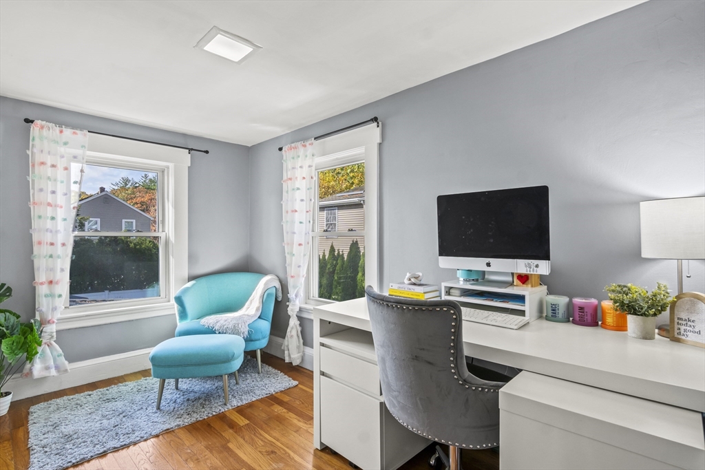 7 Allendale Avenue Billerica, MA 01821 - Photo 24 of 42 a living room with furniture and a flat screen tv