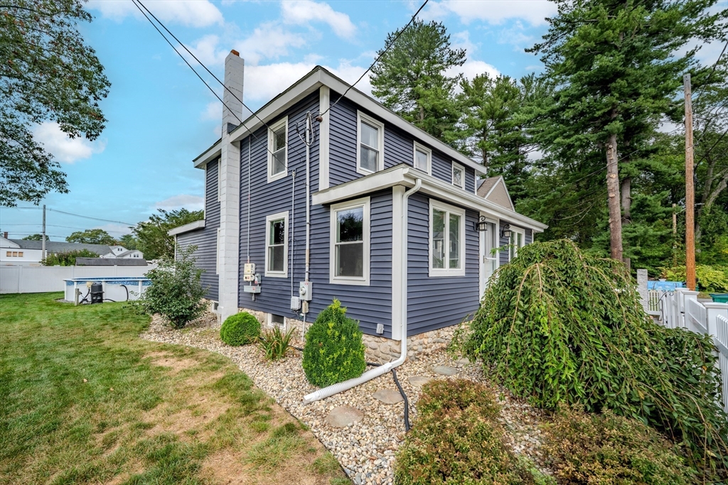 7 Allendale Avenue Billerica, MA 01821 - Photo 33 of 42 a front view of a house with a yard