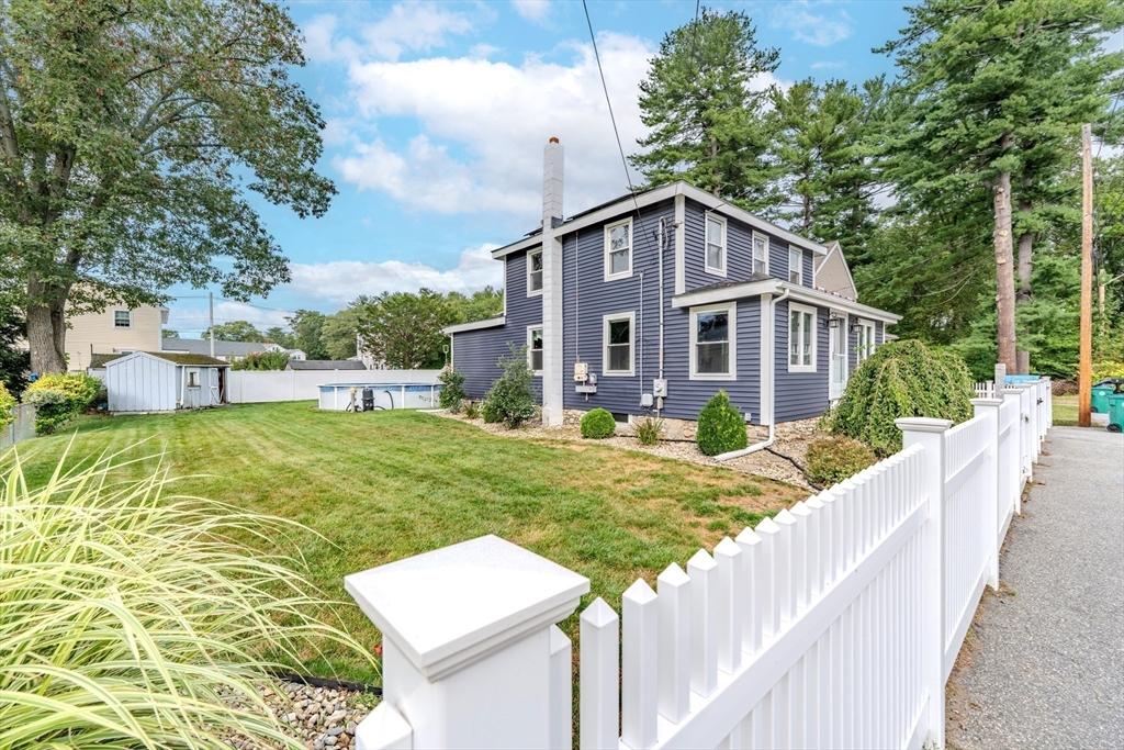 7 Allendale Avenue Billerica, MA 01821 - Photo 35 of 42 a view of an house with backyard and a tree