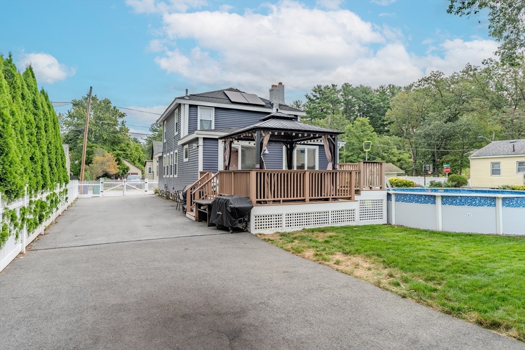7 Allendale Avenue Billerica, MA 01821 - Photo 36 of 42 a view of a house with a yard and sitting area