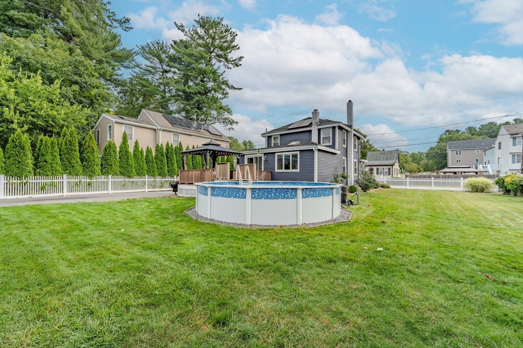 7 Allendale Avenue Billerica, MA 01821 - Photo 38 of 42 a view of a house with a big yard and sitting area