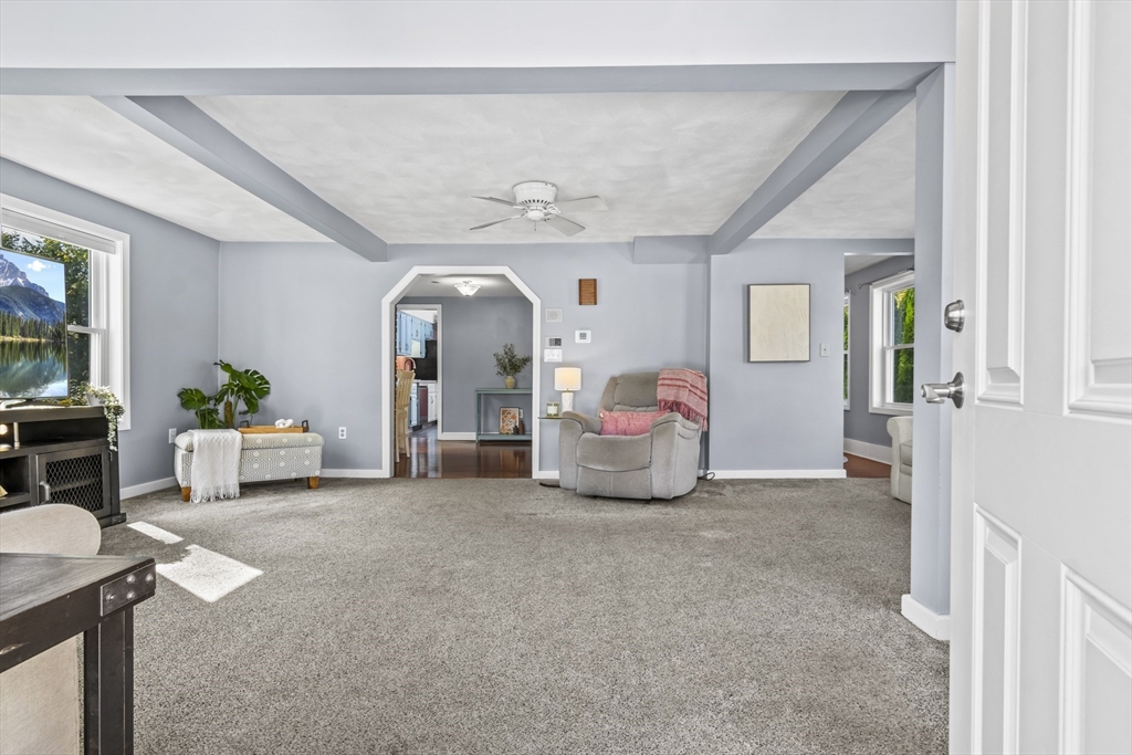 7 Allendale Avenue Billerica, MA 01821 - Photo 4 of 42 a living room with furniture and a chandelier