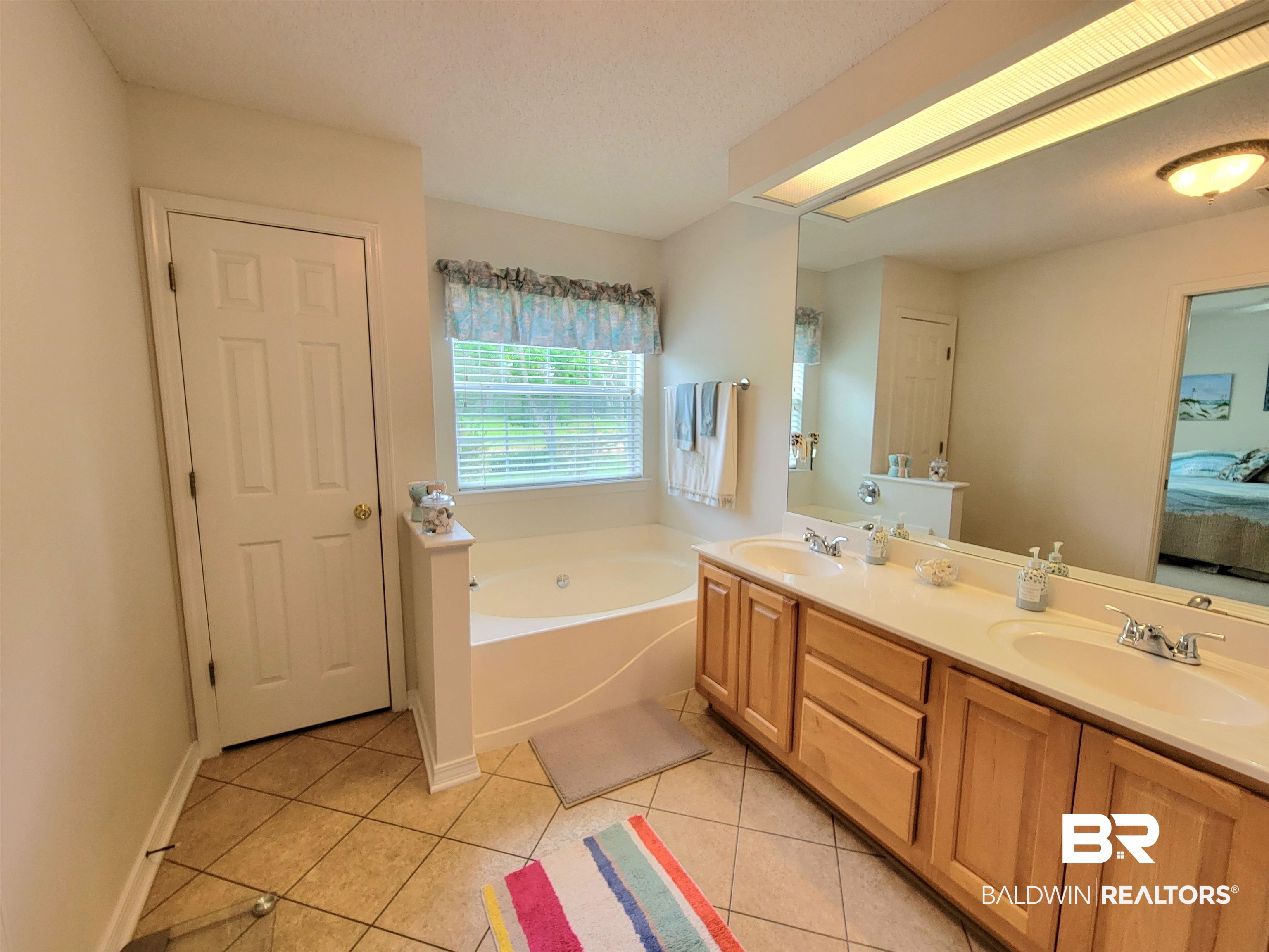 22684 Tranquil Lane Foley, AL 36535 - Photo 26 of 39 Primary Bedroom Ensuite