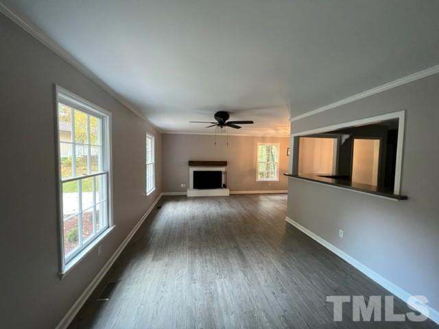 3600 Star Trek Court Raleigh, NC 27604 - Photo 11 of 25 a view of an empty room with wooden floor and a window