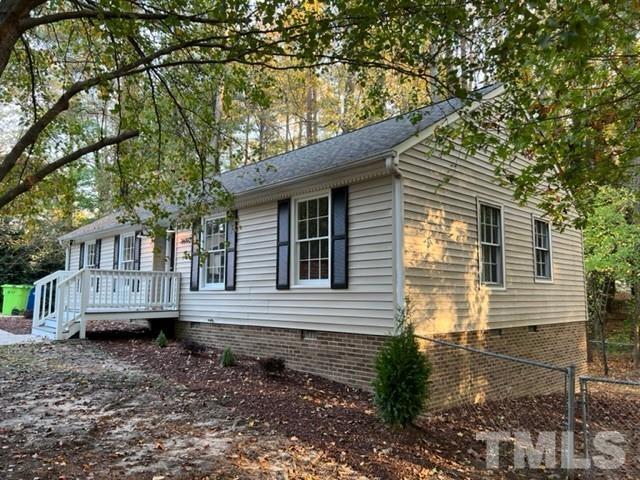 3600 Star Trek Court Raleigh, NC 27604 - Photo 2 of 25 a view of a house with a yard