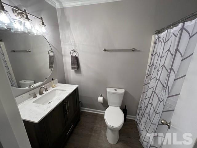 3600 Star Trek Court Raleigh, NC 27604 - Photo 25 of 25 a bathroom with a toilet sink and mirror
