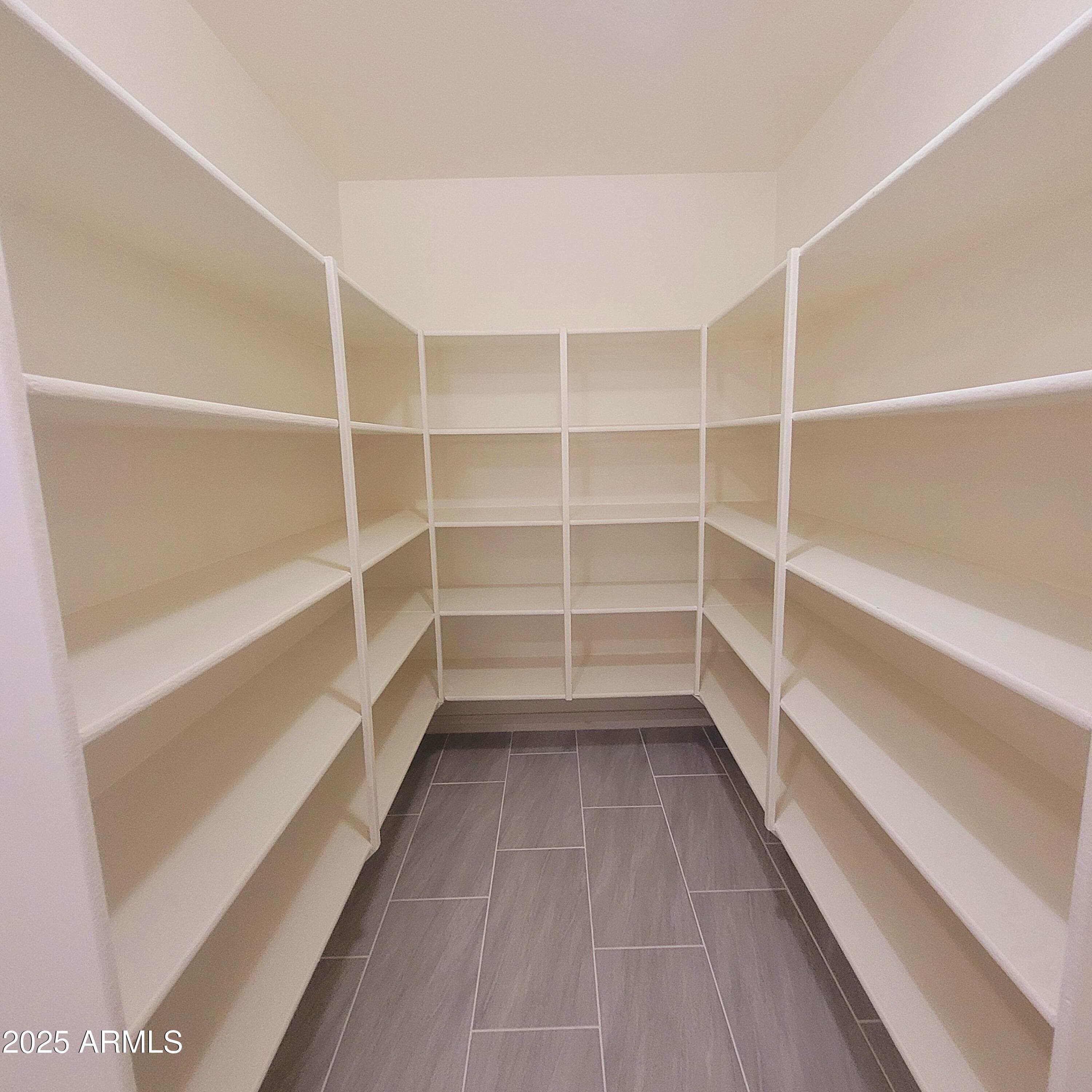 2210 East Paraiso Drive Phoenix, AZ 85024 - Photo 10 of 30 a view of a room with shelf on the wall