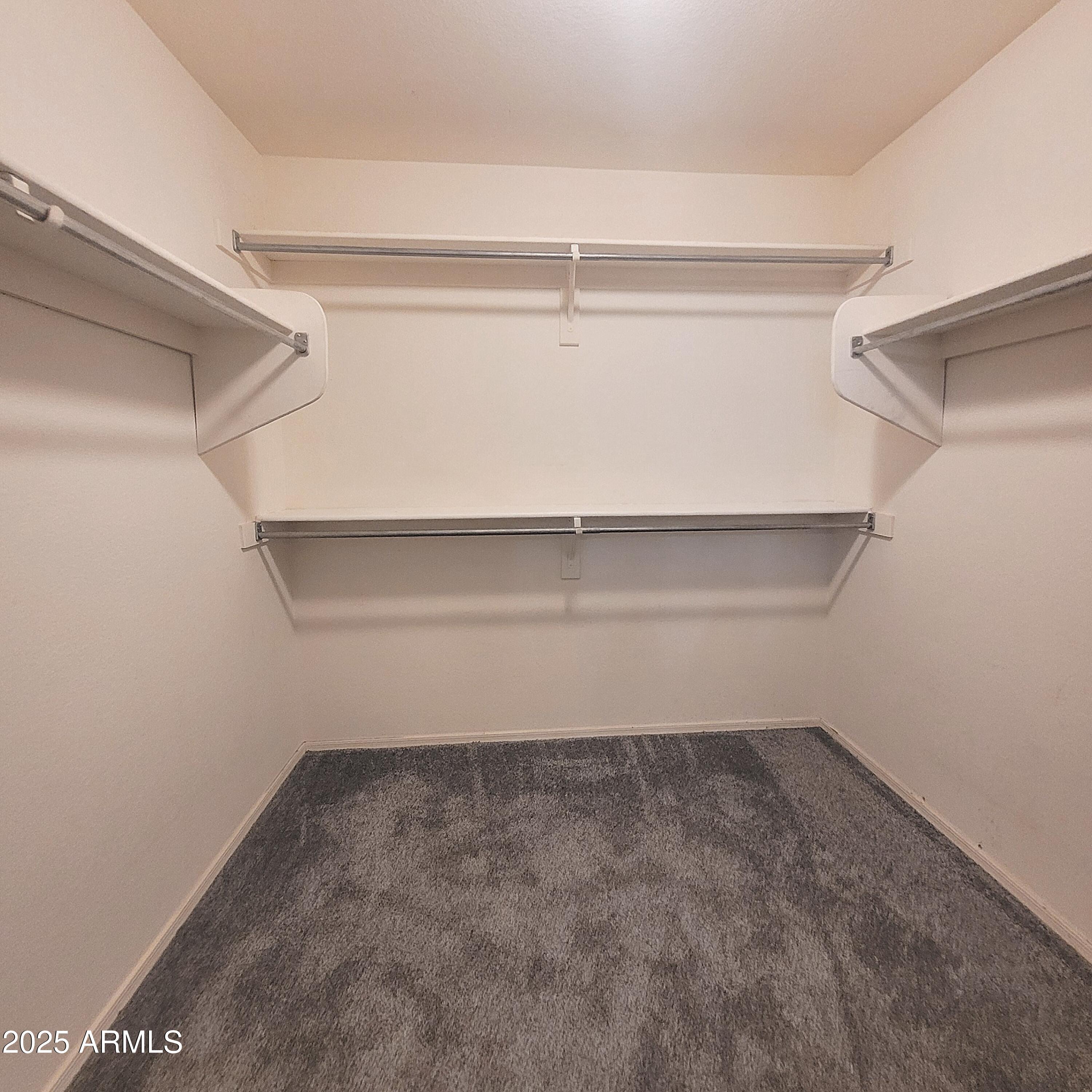 2210 East Paraiso Drive Phoenix, AZ 85024 - Photo 18 of 30 a view of an empty walk in closet