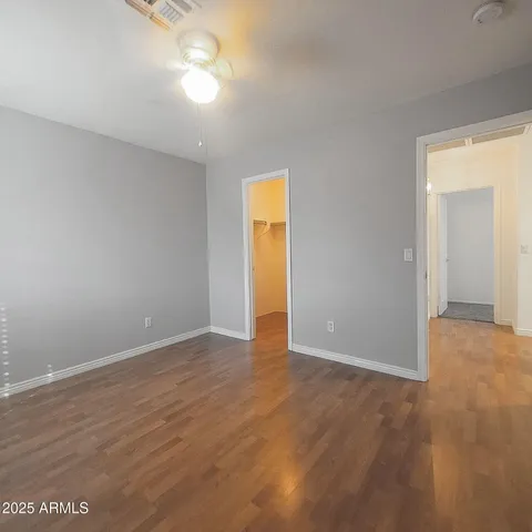 a view of an empty walk in closet