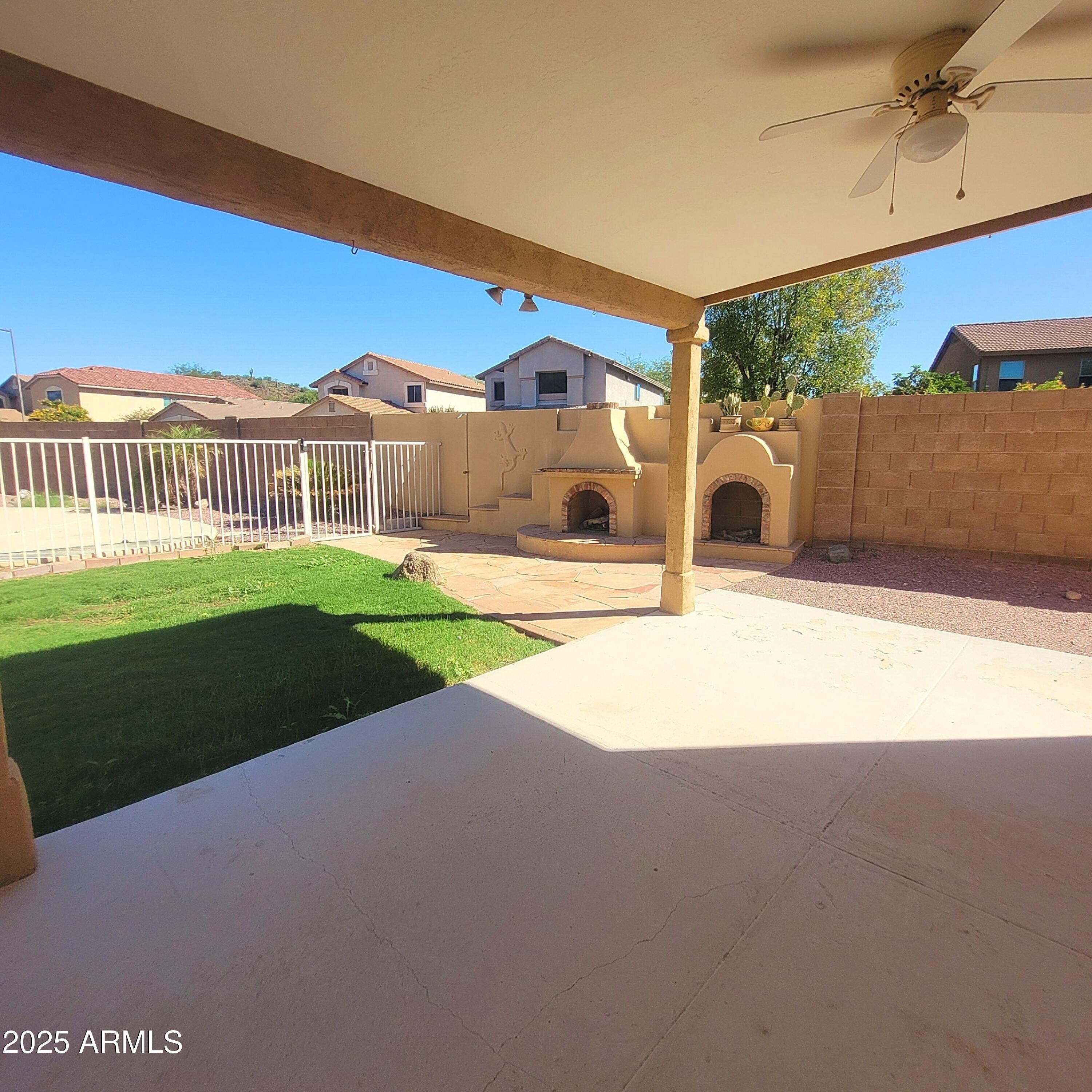 2210 East Paraiso Drive Phoenix, AZ 85024 - Photo 24 of 30 a view of a house with a yard and a garage