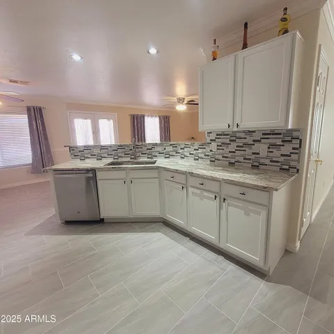 a view of a refrigerator with a white house