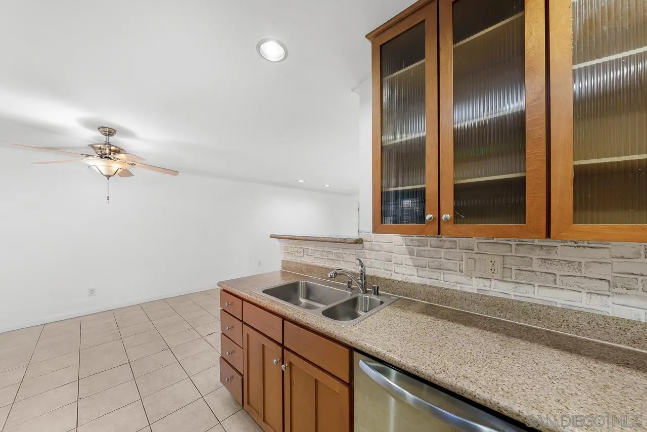 174 Chambers Street, Unit 1 El Cajon, CA 92020 - Photo 11 of 37 a kitchen with a sink and cabinets