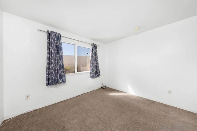 a view of an empty room with window