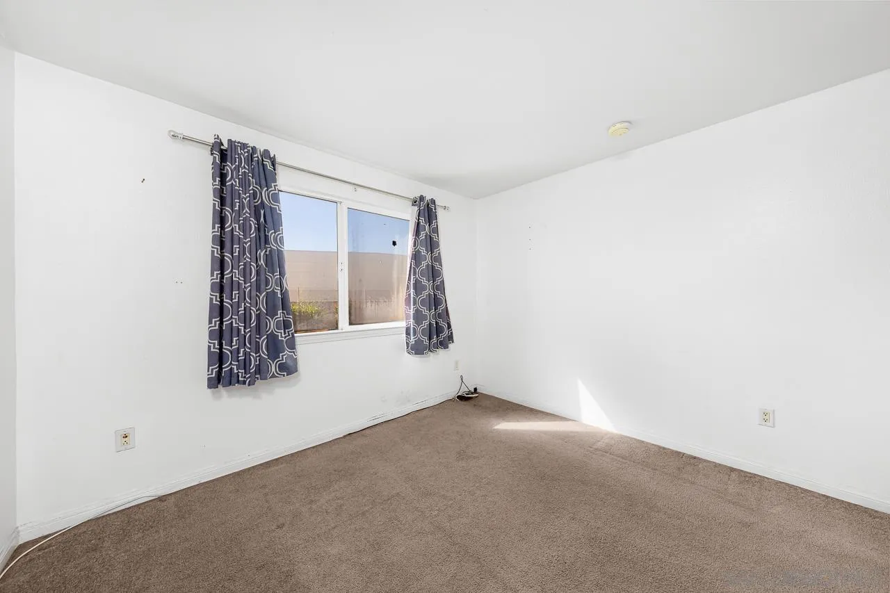 174 Chambers Street, Unit 1 El Cajon, CA 92020 - Photo 16 of 37 a view of an empty room with window