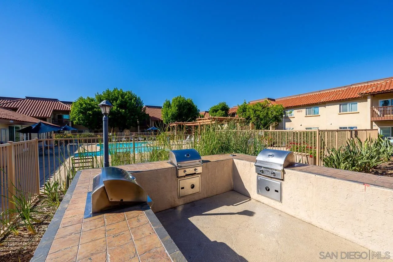 174 Chambers Street, Unit 1 El Cajon, CA 92020 - Photo 33 of 37 a building view with a garden space