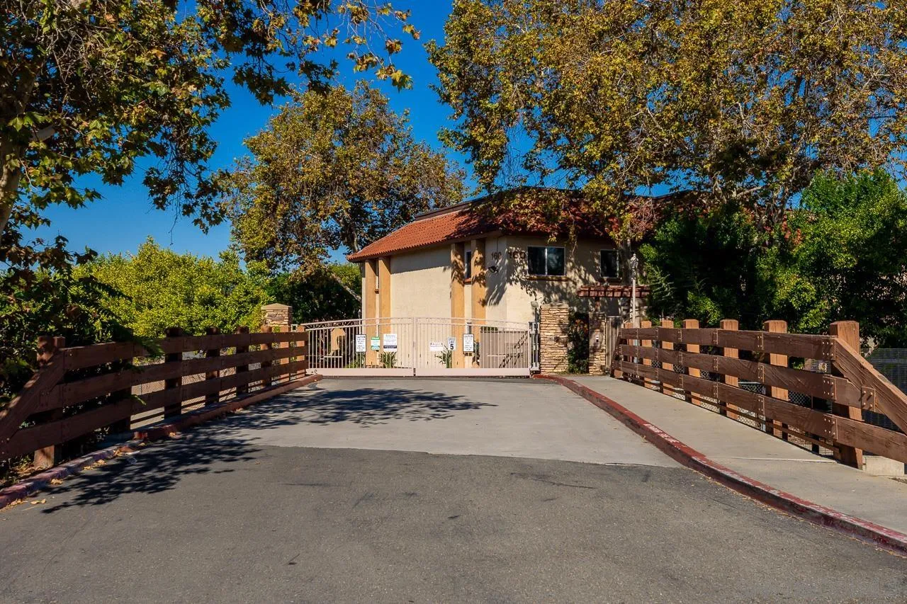 174 Chambers Street, Unit 1 El Cajon, CA 92020 - Photo 36 of 37 a view of a house with a plants and trees