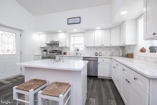 137 Manor Road Gibbsboro, NJ 08026 - Photo 5 of 26 a kitchen with granite countertop a sink stainless steel appliances and cabinets