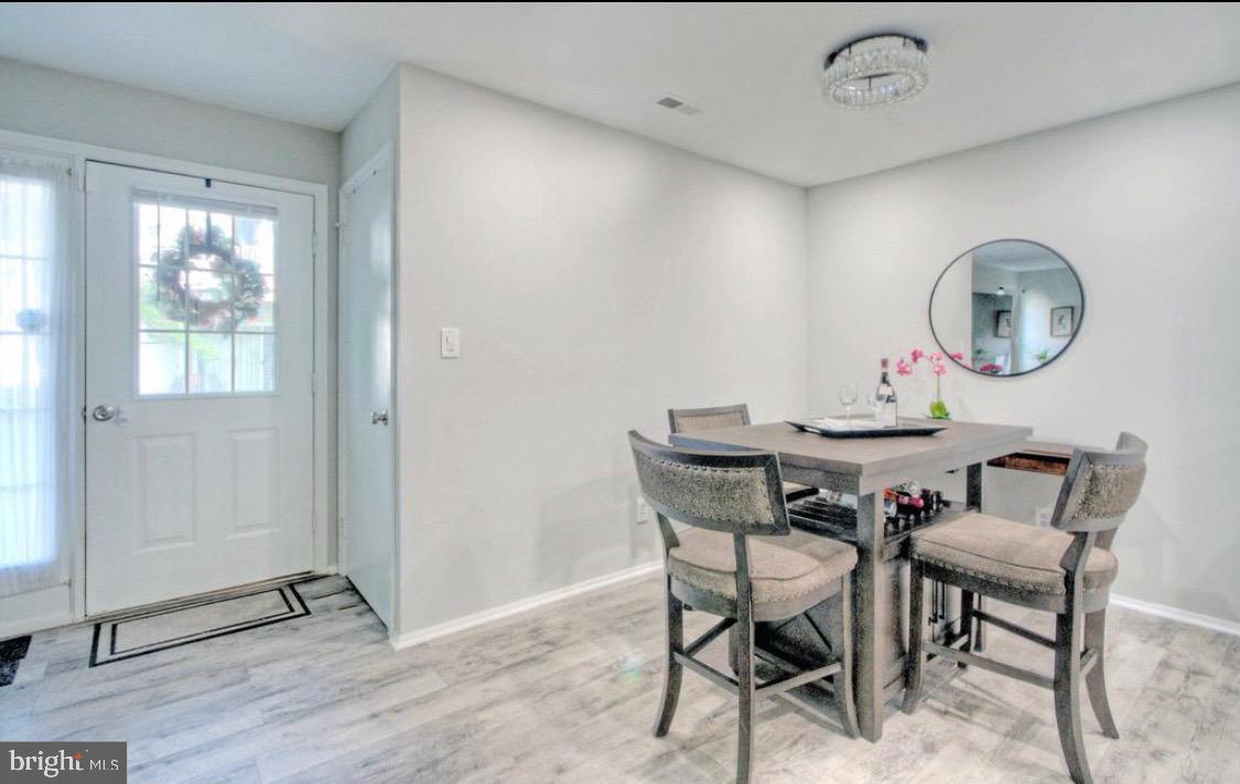 405 Quail Road Marlton, NJ 08053 - Photo 12 of 20 a view of a dining room with furniture