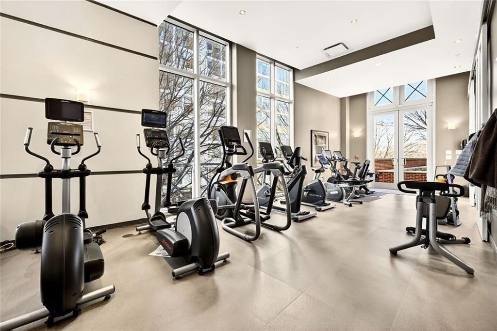1820 Peachtree Road Northwest, Unit 905 Atlanta, GA 30309 - Photo 30 of 41 a view of a room with gym equipment