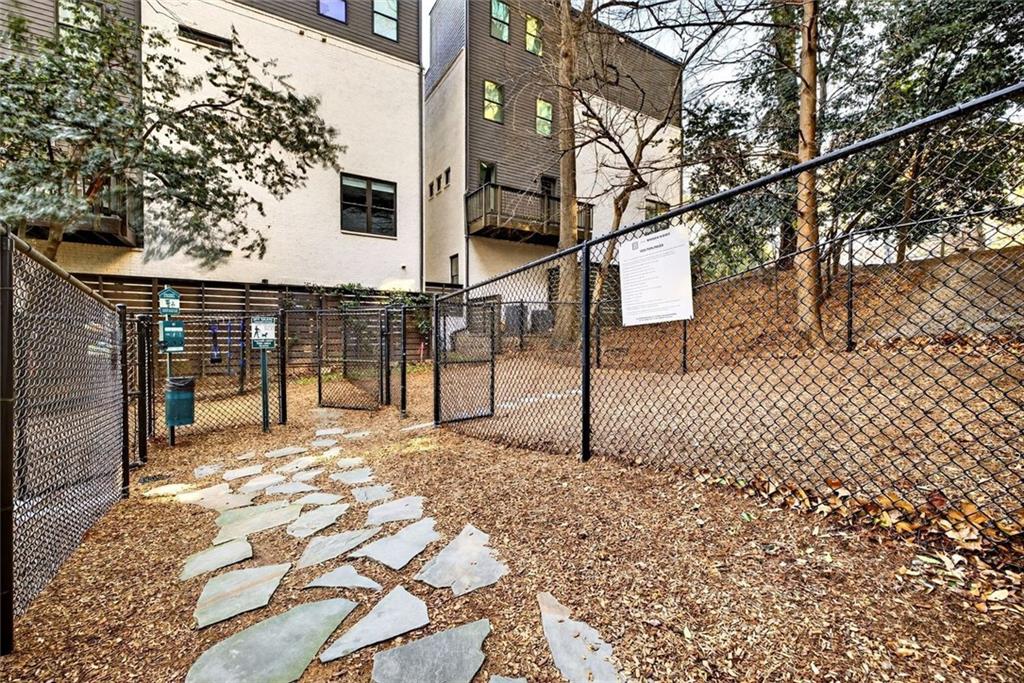 1820 Peachtree Road Northwest, Unit 905 Atlanta, GA 30309 - Photo 37 of 41 a view of a house with a snow in the yard