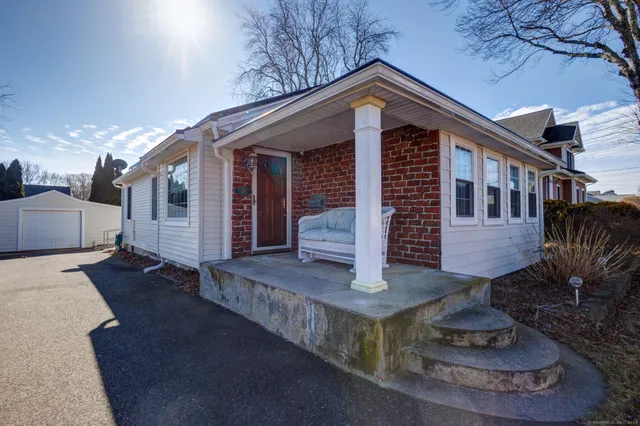 a front view of house with a yard