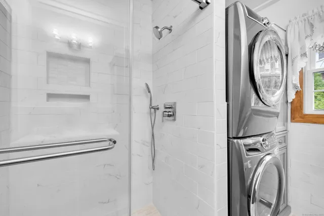 a utility room with dryer and washer