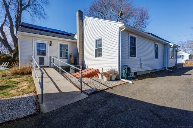 a view of backyard with deck