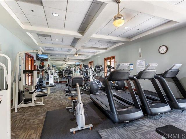 a view of outdoor space with seating area and trees around