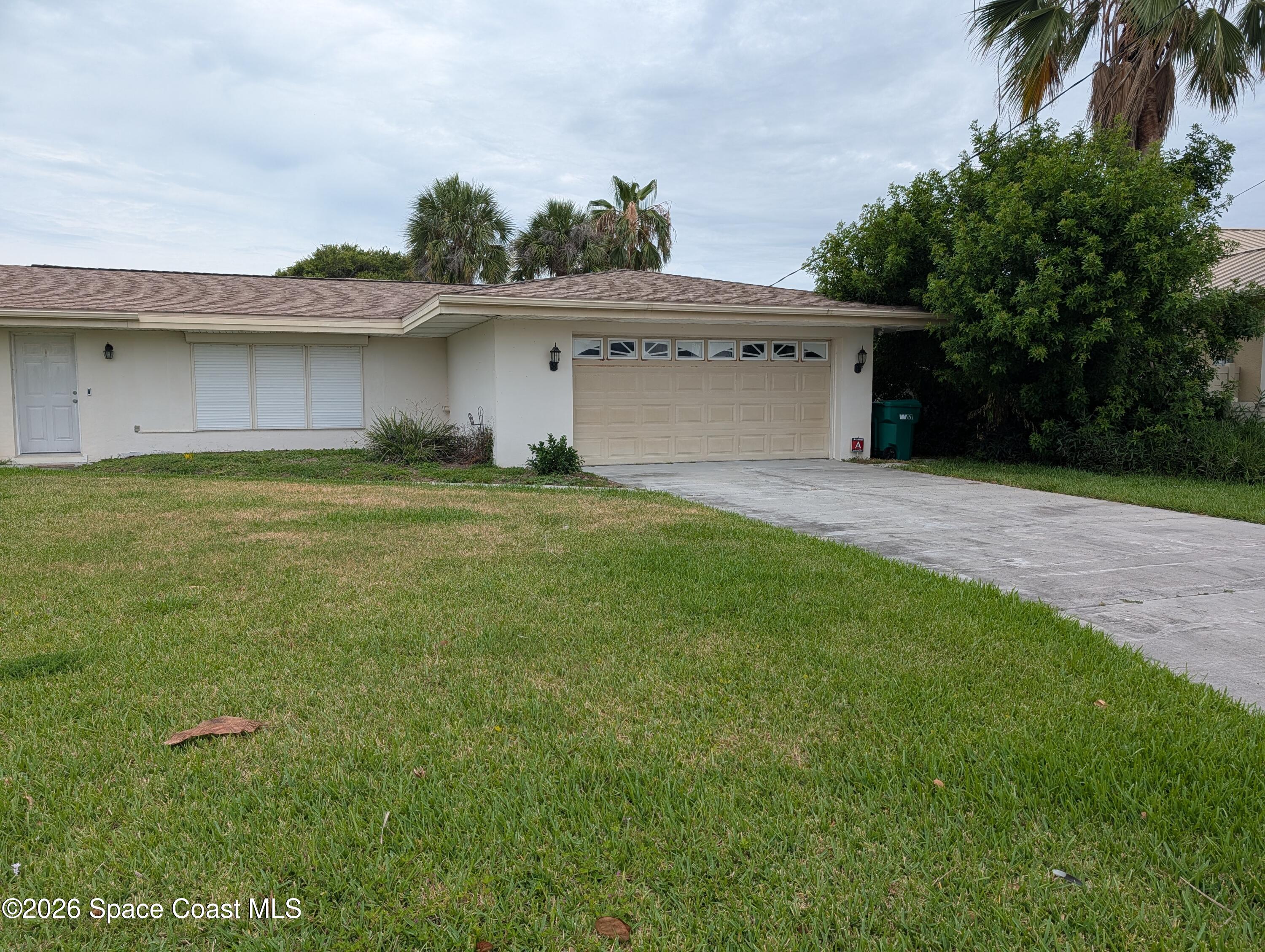 597 Capri Road Cocoa Beach, FL 32931 - Photo 2 of 33 PXL_20260609_170216434