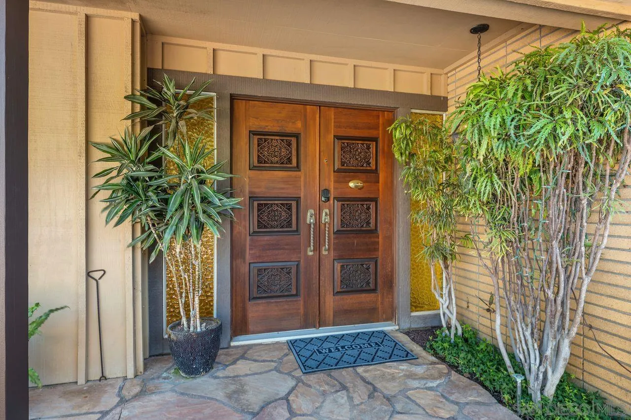5504 Rutgers Road La Jolla, CA 92037 - Photo 12 of 53 a couple of potted plants in front of door