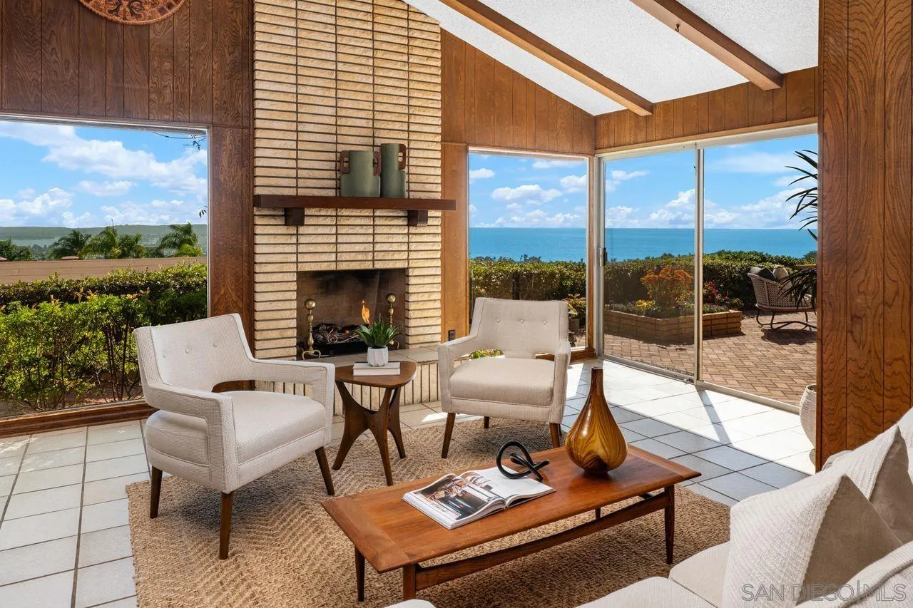 5504 Rutgers Road La Jolla, CA 92037 - Photo 25 of 53 a outdoor space with patio the couches and a fireplace