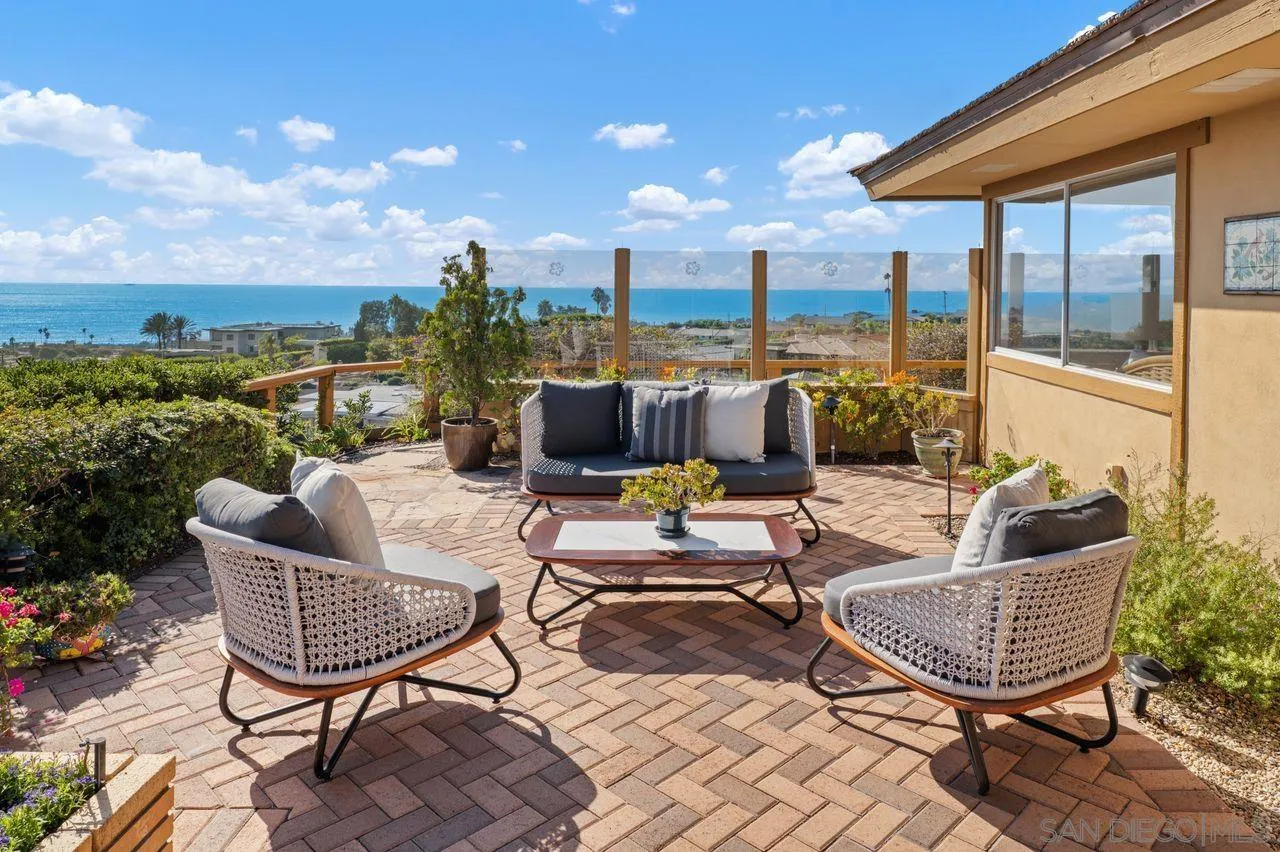 5504 Rutgers Road La Jolla, CA 92037 - Photo 27 of 53 a balcony with furniture and outdoor seating