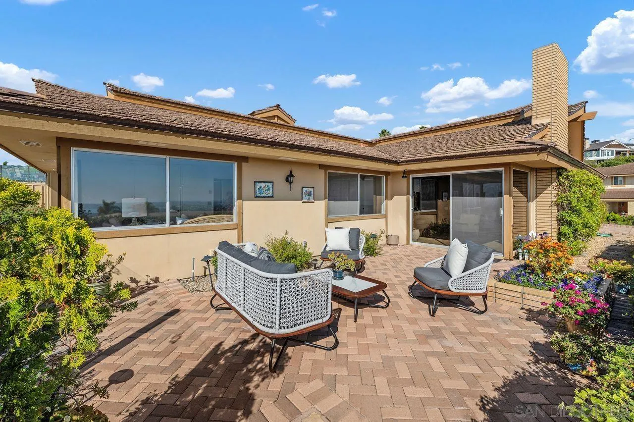 5504 Rutgers Road La Jolla, CA 92037 - Photo 29 of 53 a view of a house with backyard and sitting area