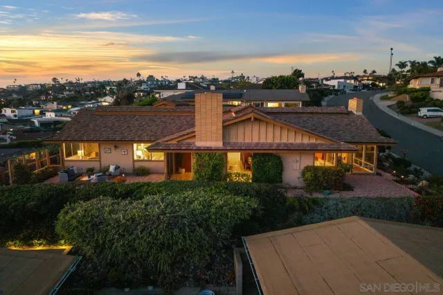 an aerial view of residential building with parking space