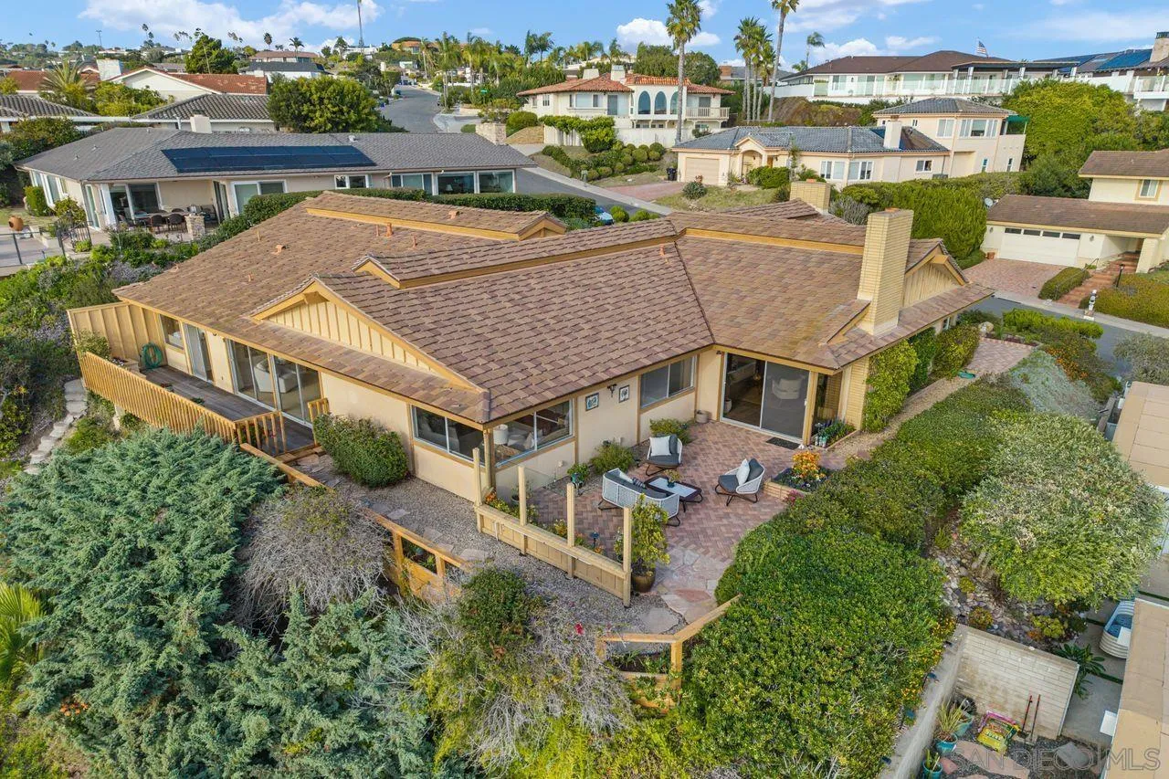 5504 Rutgers Road La Jolla, CA 92037 - Photo 10 of 53 an aerial view of a house with a garden and lake view