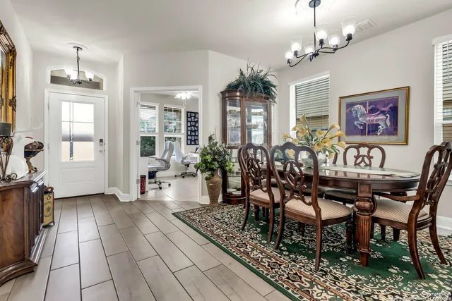 a view of a dining room with furniture
