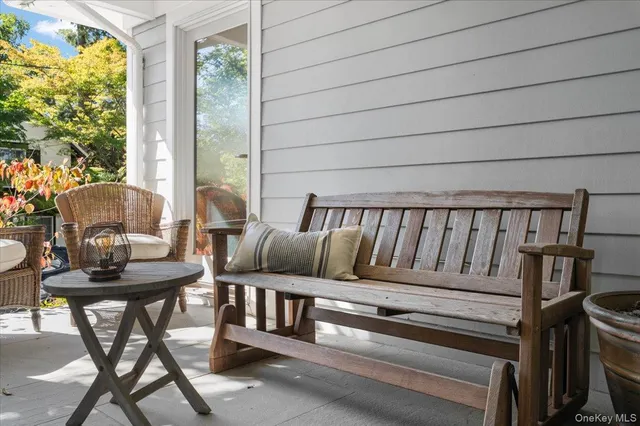 a reading room with furniture and window