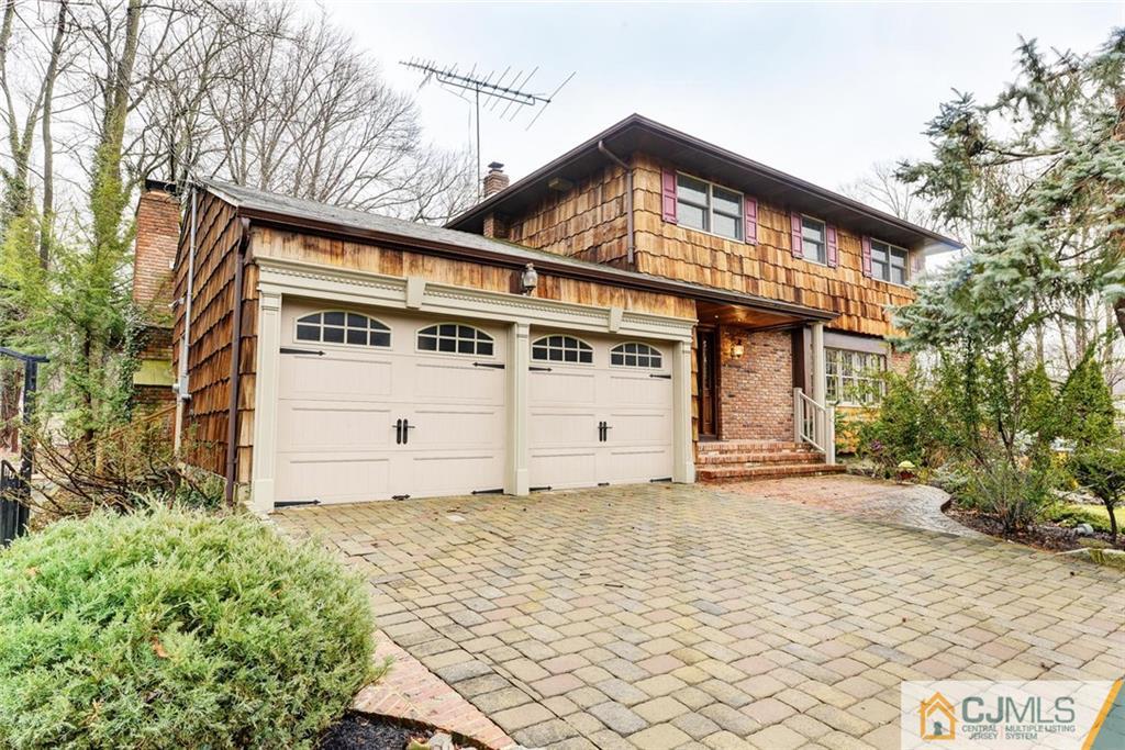52 Hillsdale Road Edison, NJ 08820 - Photo 1 of 25 a front view of a house with a yard