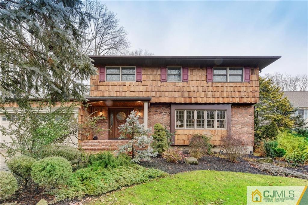 52 Hillsdale Road Edison, NJ 08820 - Photo 2 of 25 front view of a house with a garden