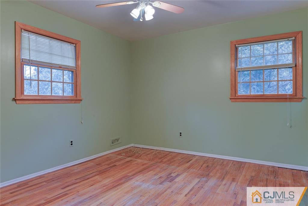 52 Hillsdale Road Edison, NJ 08820 - Photo 19 of 25 an empty room with a window