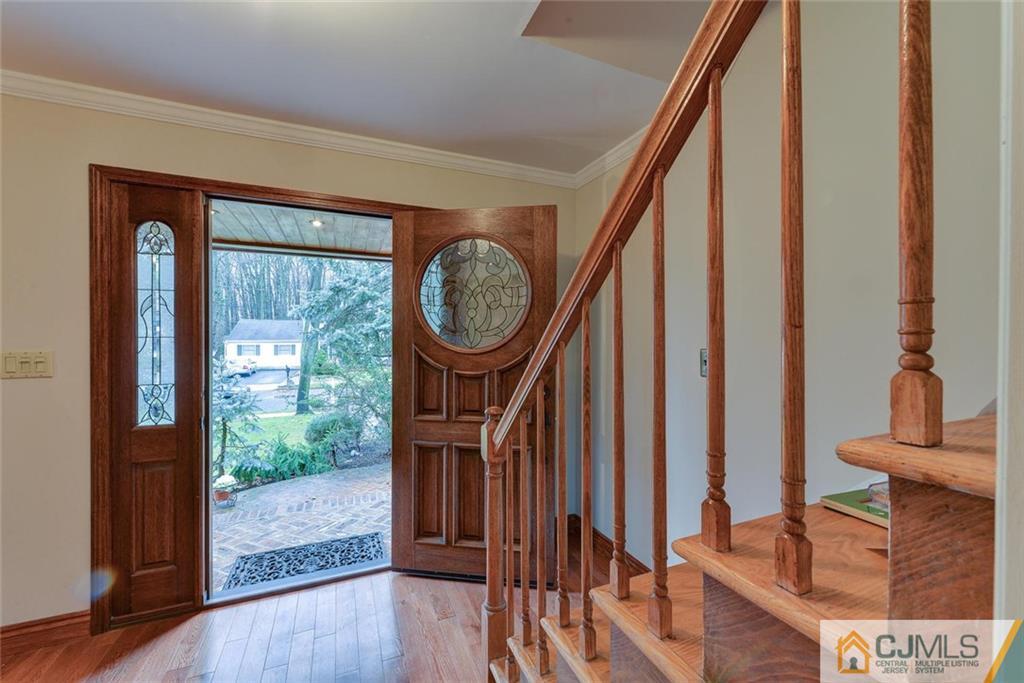 52 Hillsdale Road Edison, NJ 08820 - Photo 3 of 25 a view of entryway with wooden floor and front door