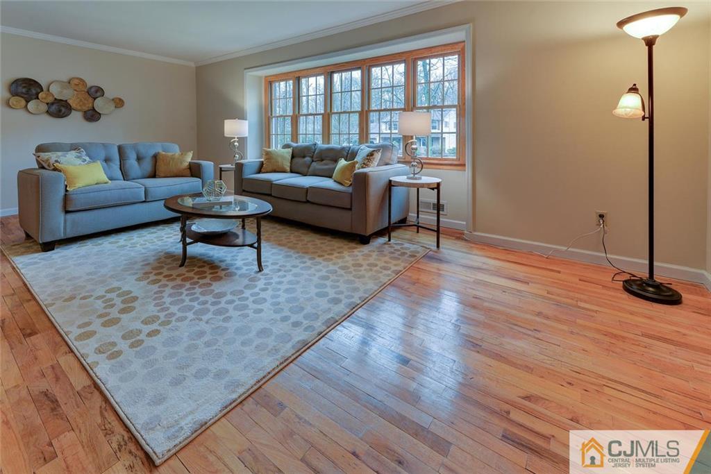 52 Hillsdale Road Edison, NJ 08820 - Photo 4 of 25 a living room with furniture and a wooden floor