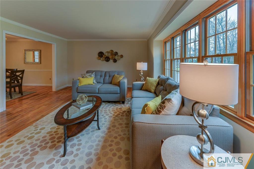 52 Hillsdale Road Edison, NJ 08820 - Photo 5 of 25 a living room with furniture and a wooden floor