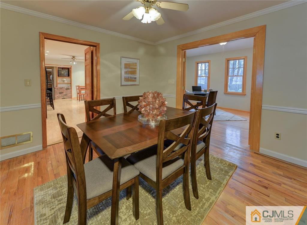 52 Hillsdale Road Edison, NJ 08820 - Photo 6 of 25 a view of a dining room with furniture and wooden floor