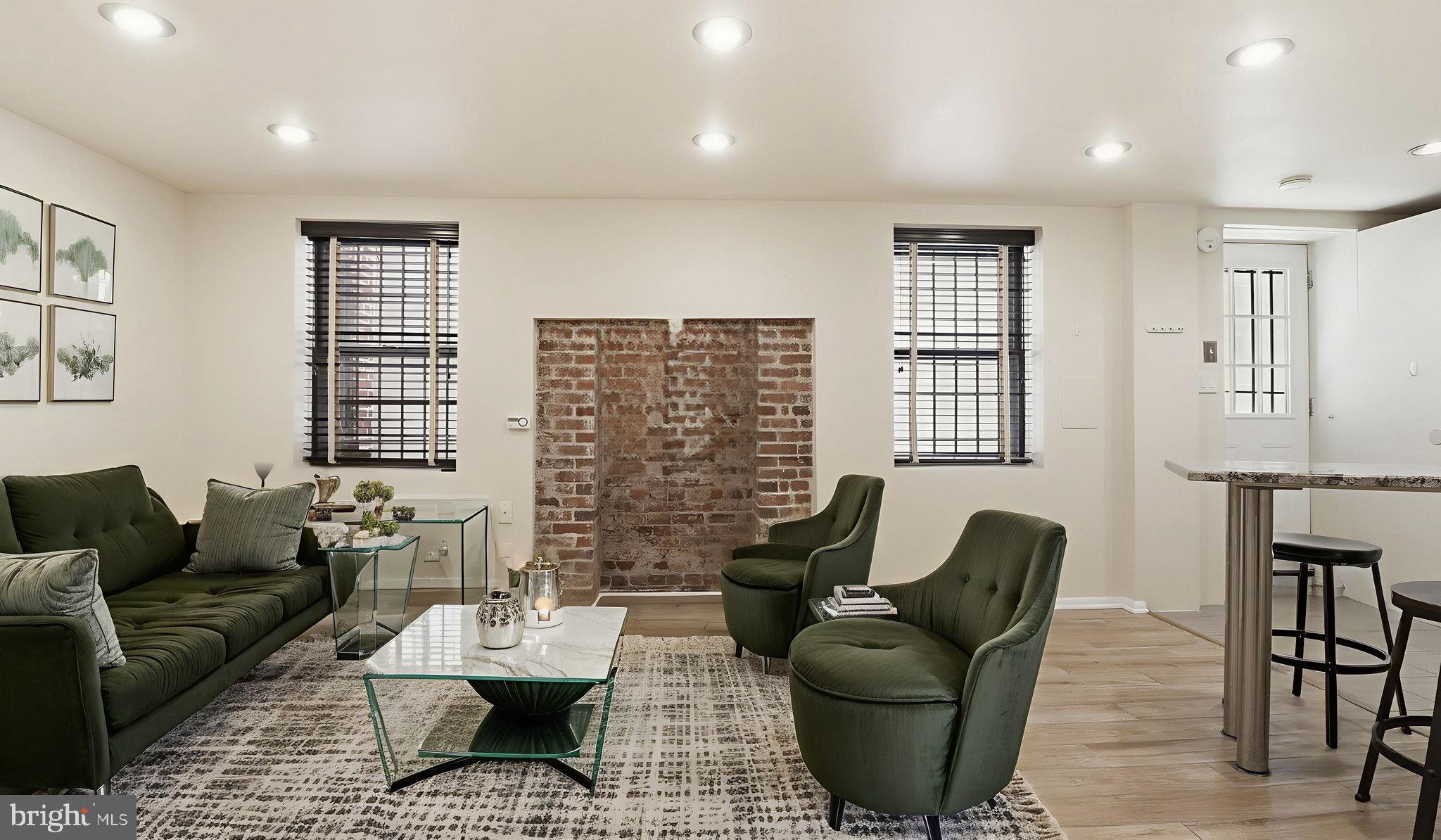 1450 Harvard Street Northwest, Unit B Washington, DC 20009 - Photo 8 of 35 a living room with furniture and a window