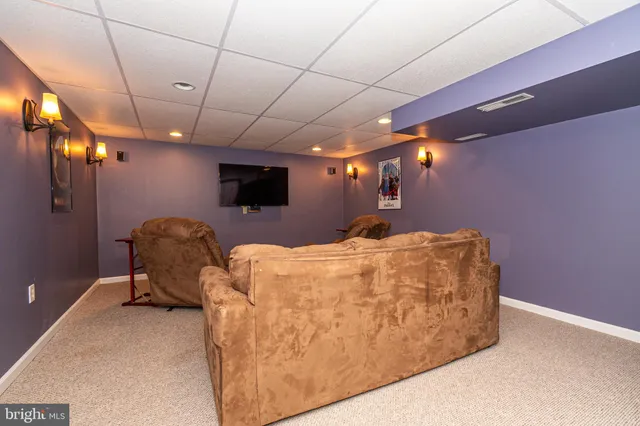 a view of a storage area with racks on the wall