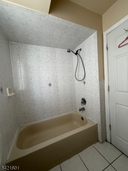 41 3rd Street Newark, NJ 07107 - Photo 23 of 31 a bathroom with a bath tub and a shower