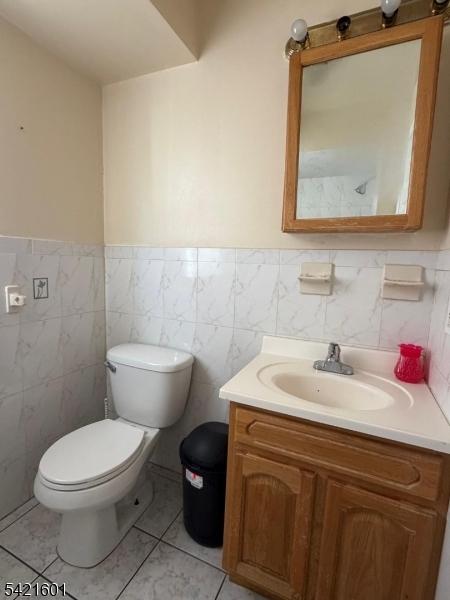 41 3rd Street Newark, NJ 07107 - Photo 27 of 31 a bathroom with a sink and a toilet