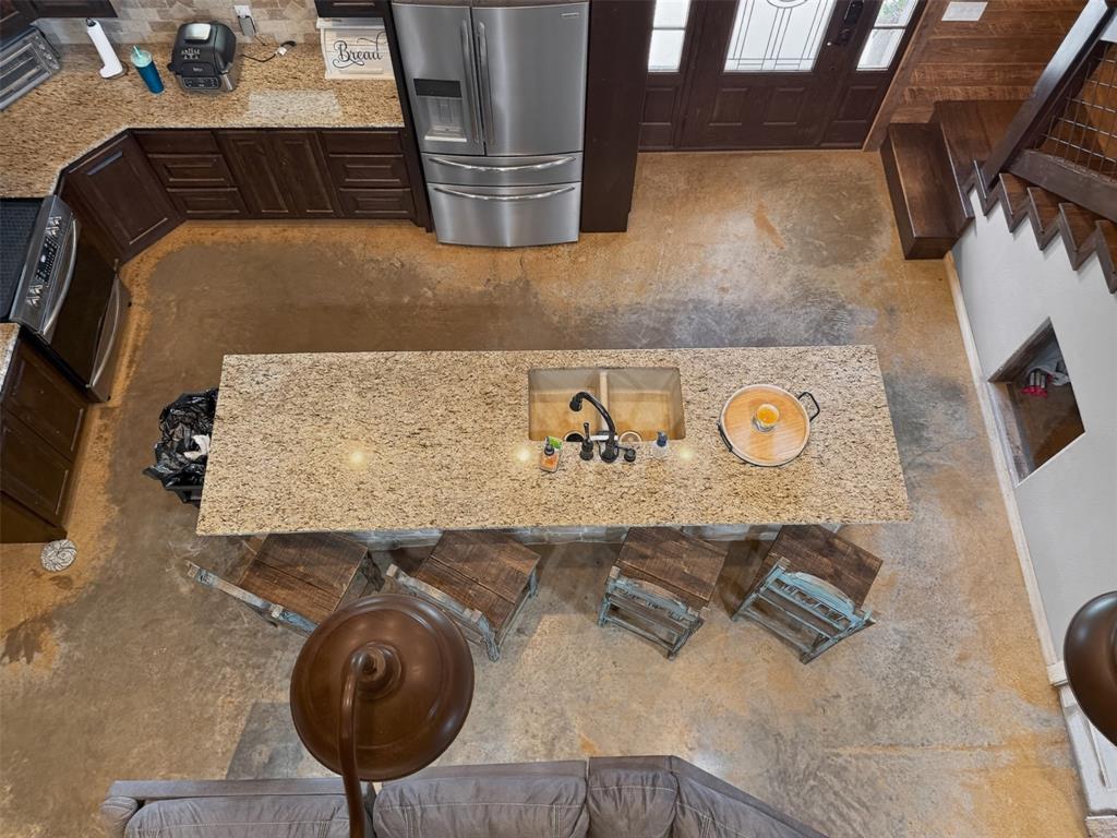 1524 County Road Sumner, TX 75486 - Photo 15 of 35 over looking the kitchen from the @ upstairs loft area